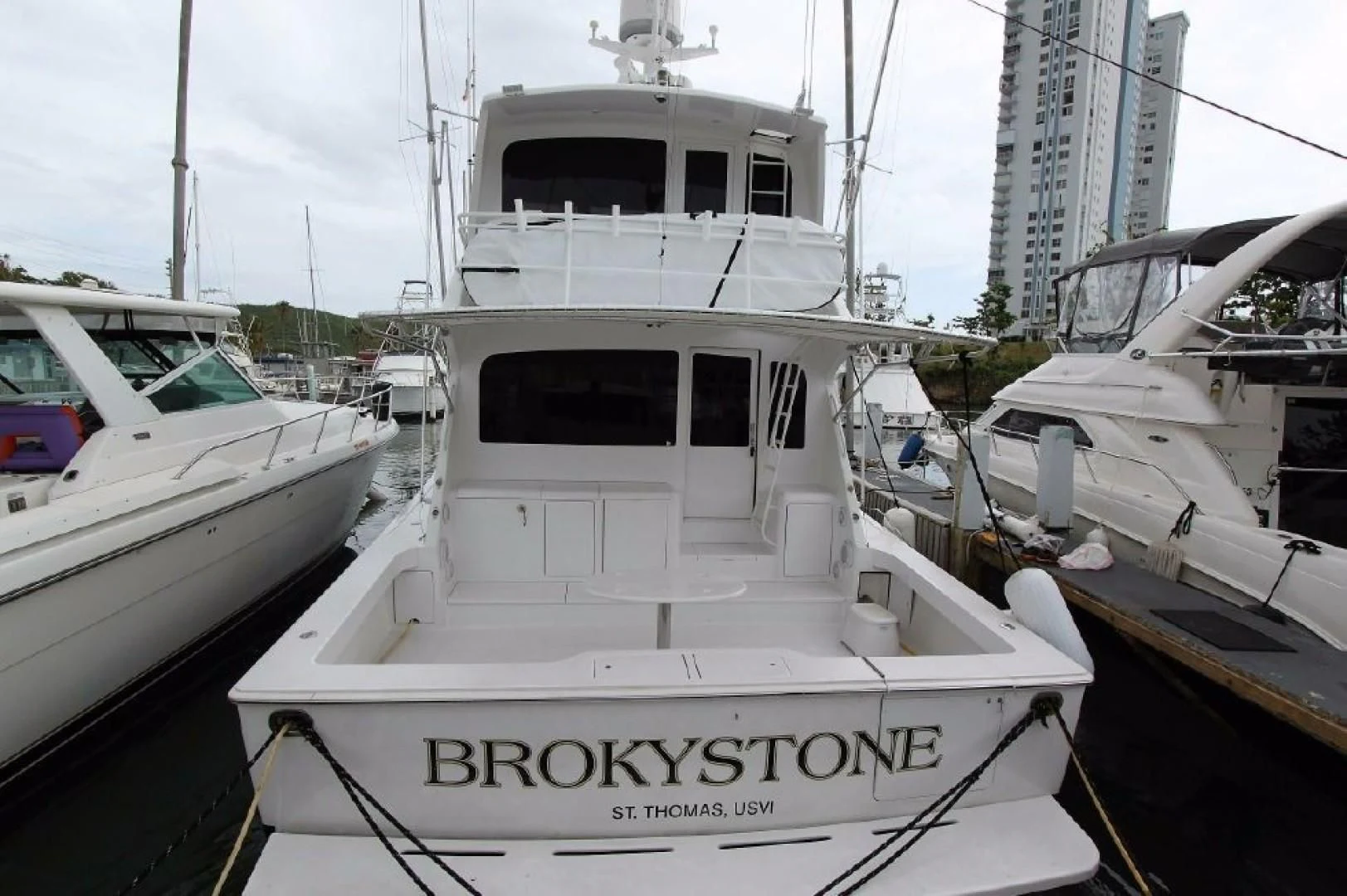 a group of boats are parked in a harbor aboard BROKYSTONE Yacht for Sale