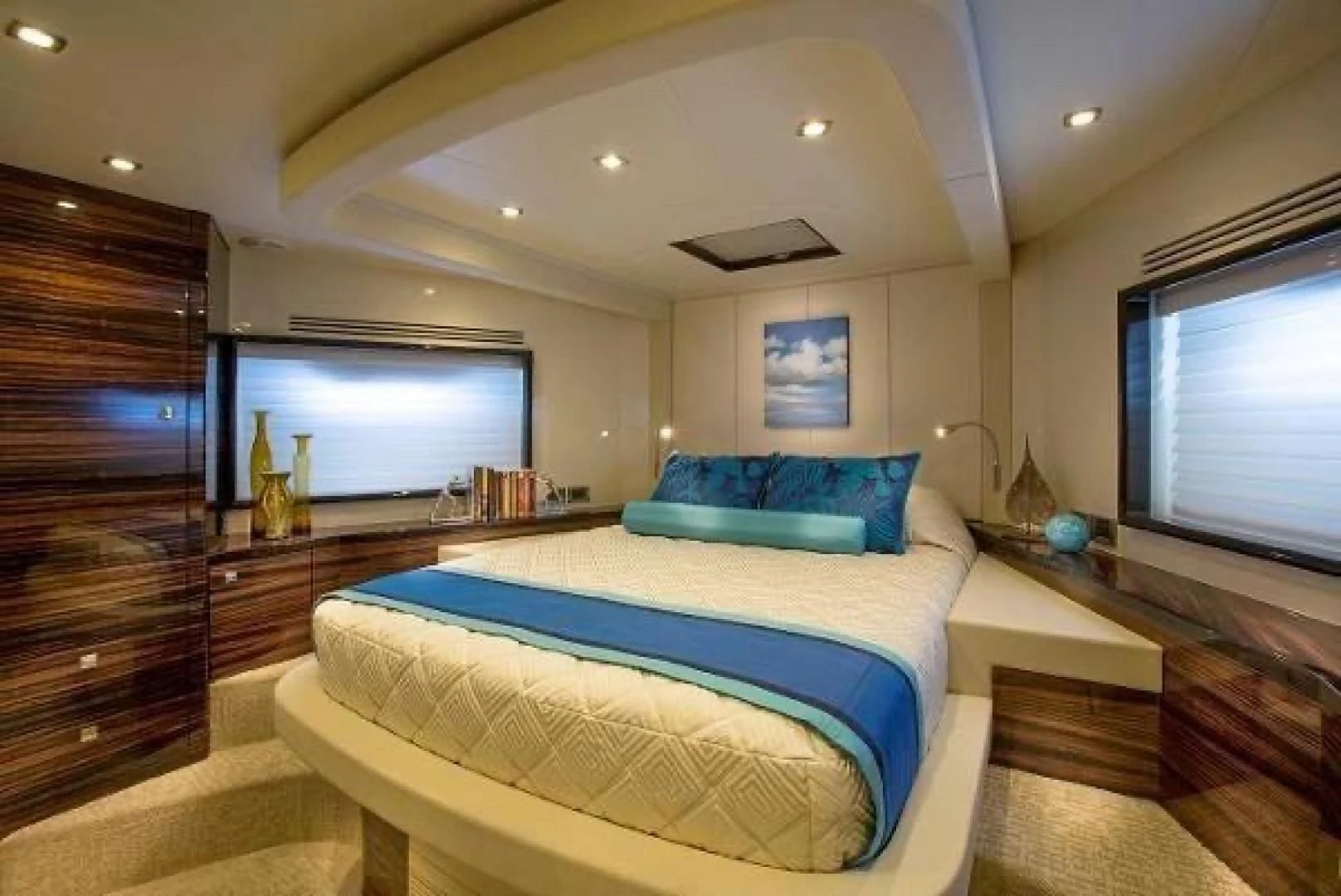 a large bedroom with a large bed aboard FUJIMO Yacht for Sale