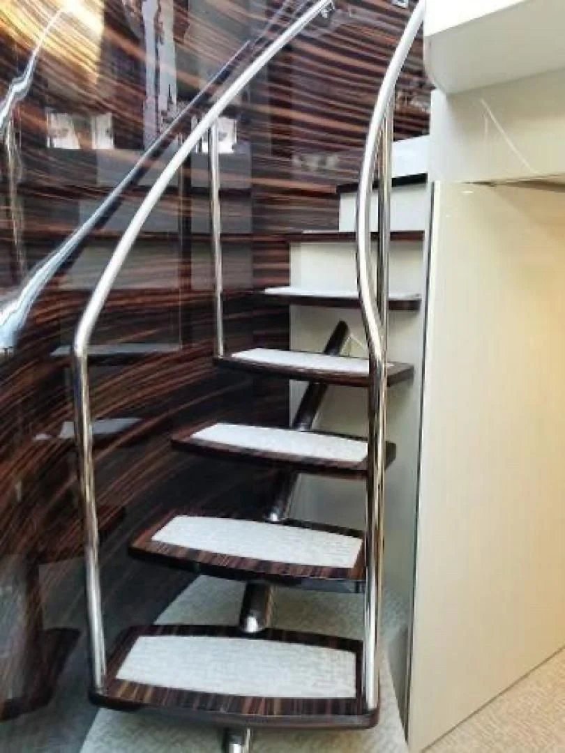 a set of metal stairs aboard FUJIMO Yacht for Sale