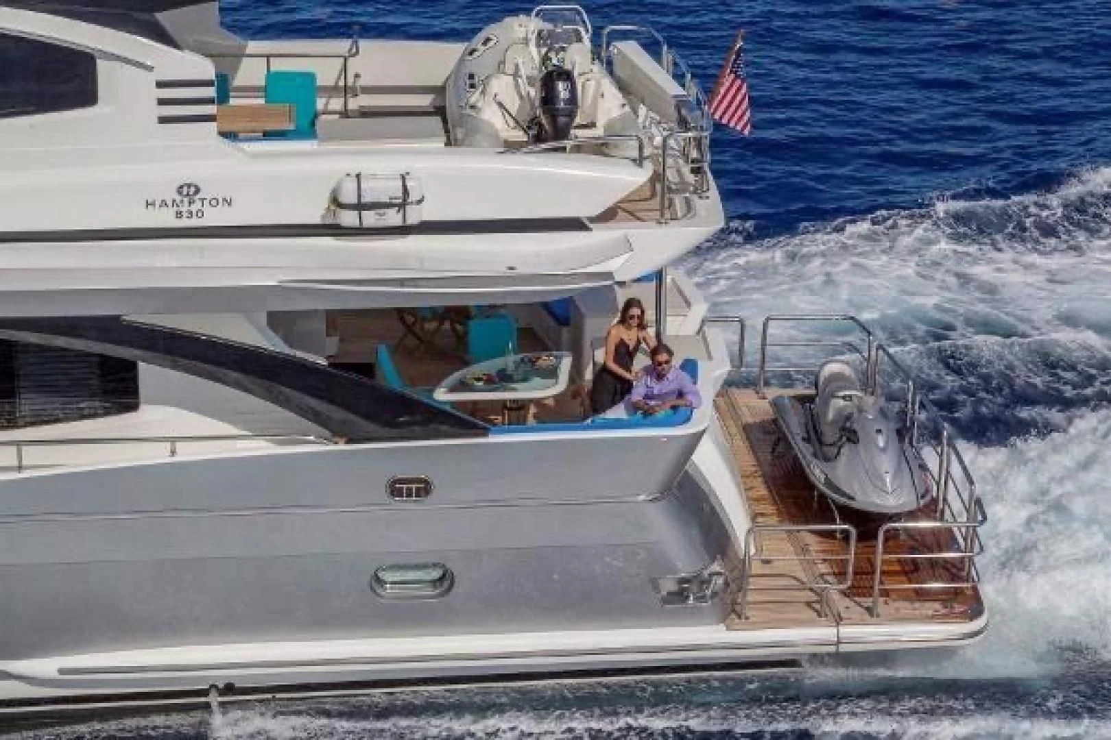 a couple of people on a boat aboard FUJIMO Yacht for Sale