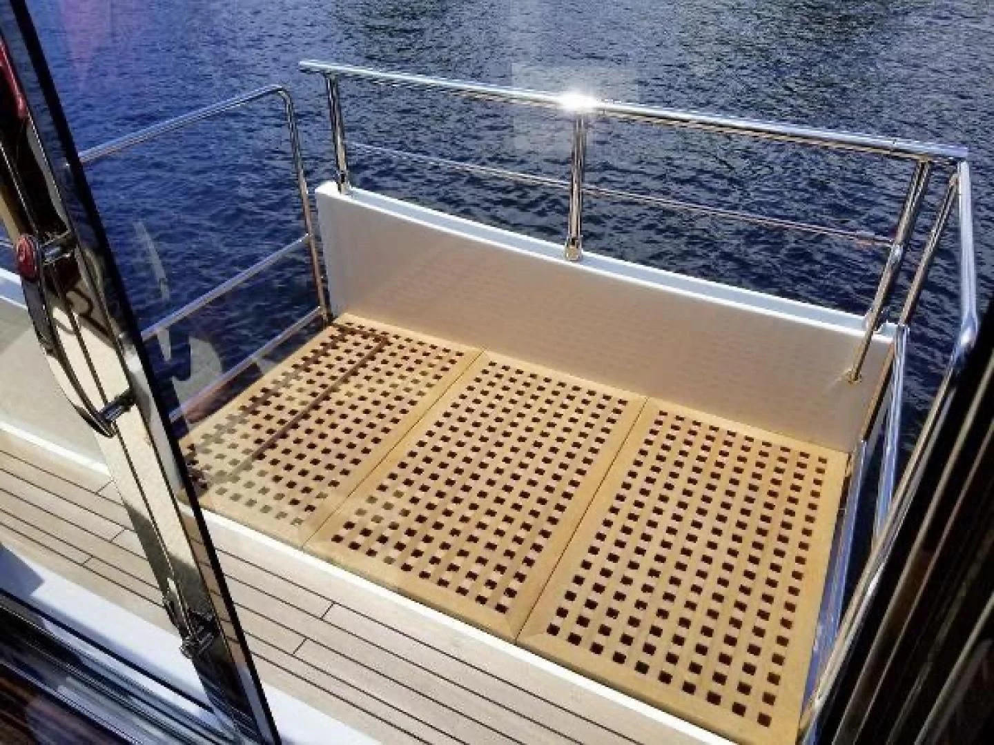 a deck with a railing and a railing on the side aboard FUJIMO Yacht for Sale