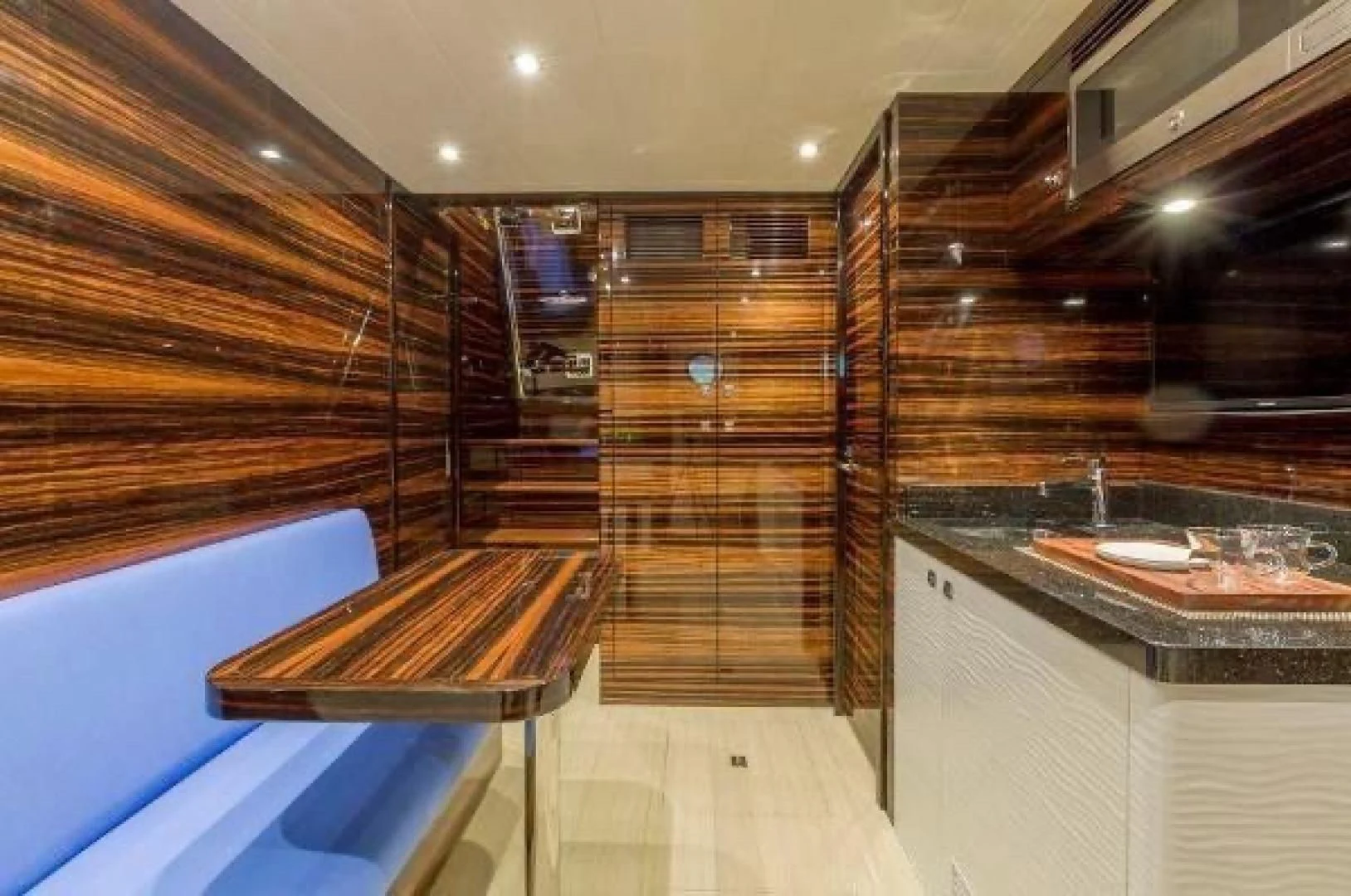 a room with a large glass wall aboard FUJIMO Yacht for Sale
