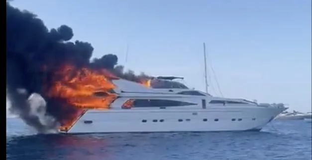a boat on fire aboard IRMAO Yacht for Sale