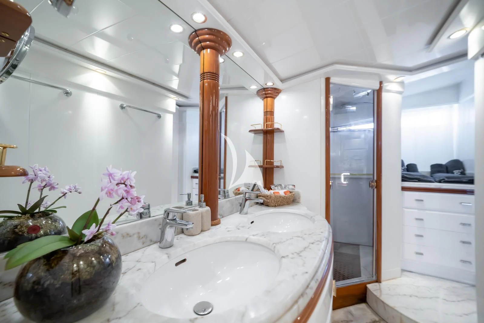 a bathroom with a sink and a shower aboard IRMAO Yacht for Sale