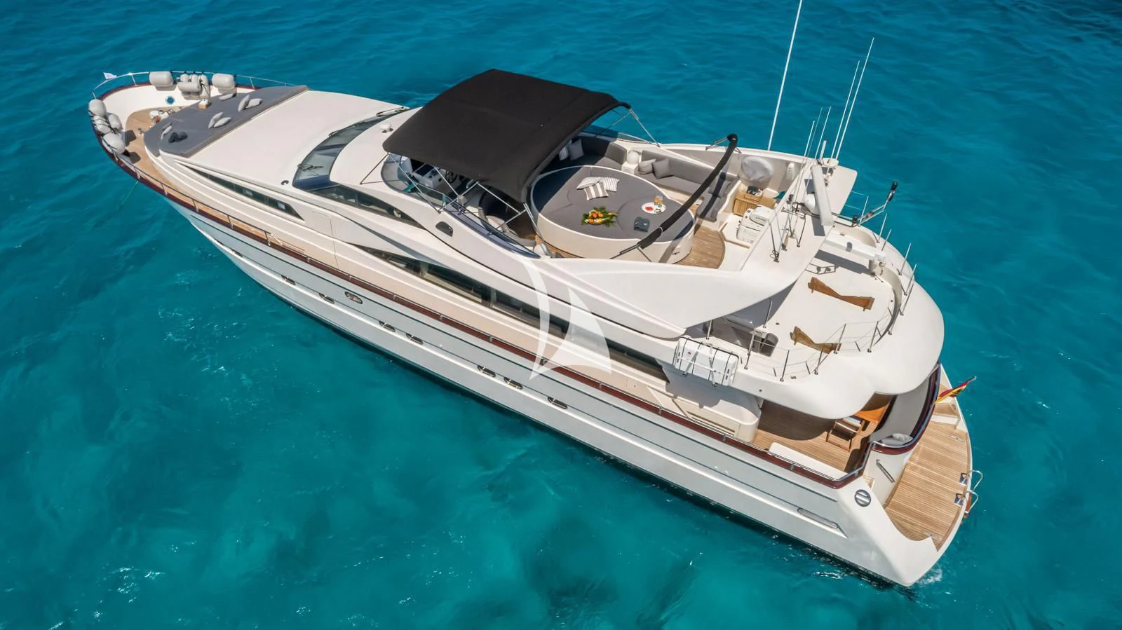 a white yacht in the water aboard IRMAO Yacht for Sale