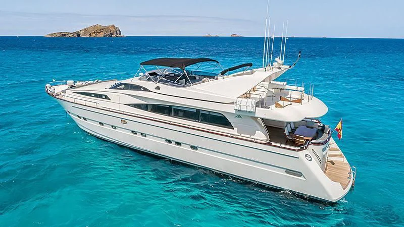 a white yacht in the water aboard IRMAO Yacht for Sale