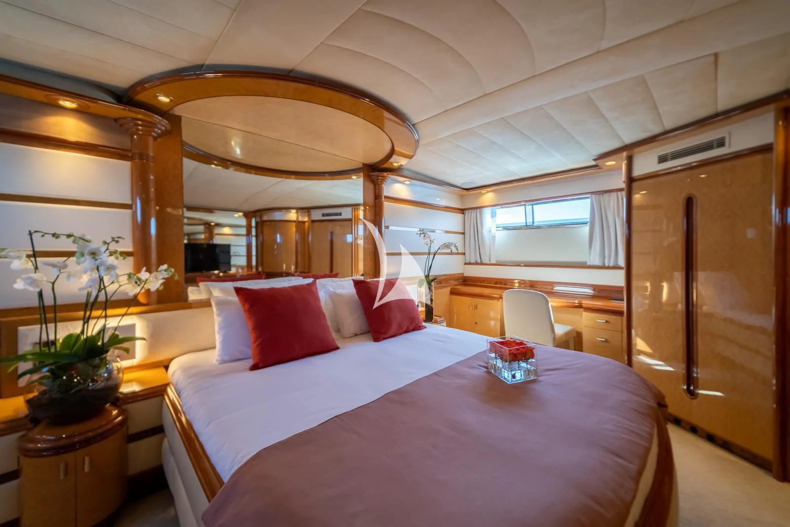 a bed in a room aboard IRMAO Yacht for Sale