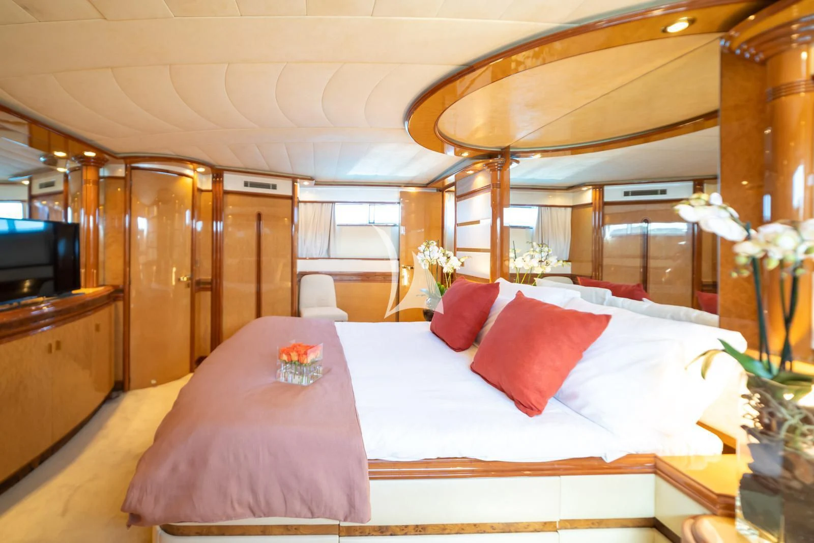 a bed with pink pillows aboard IRMAO Yacht for Sale