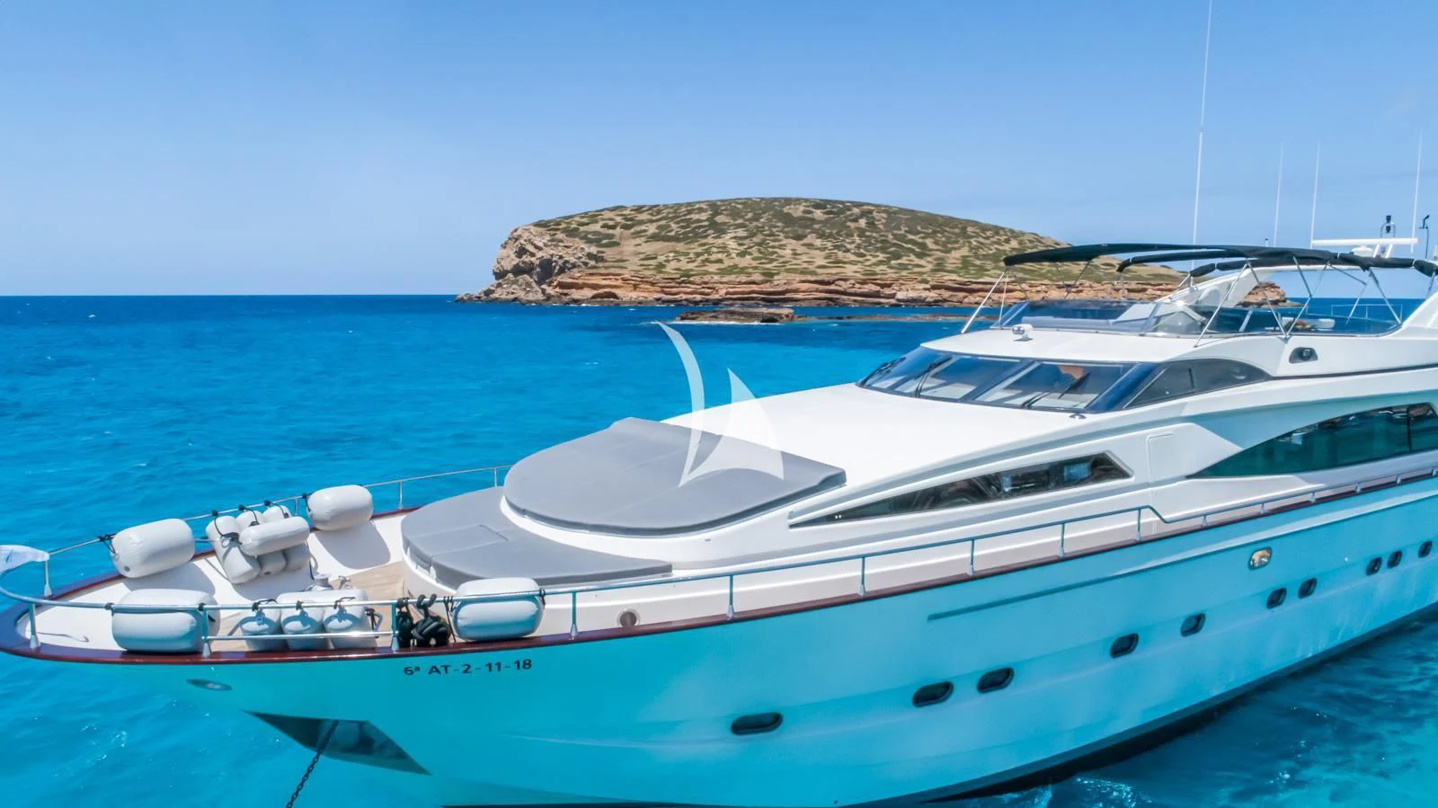 a couple of yachts in the water aboard IRMAO Yacht for Sale