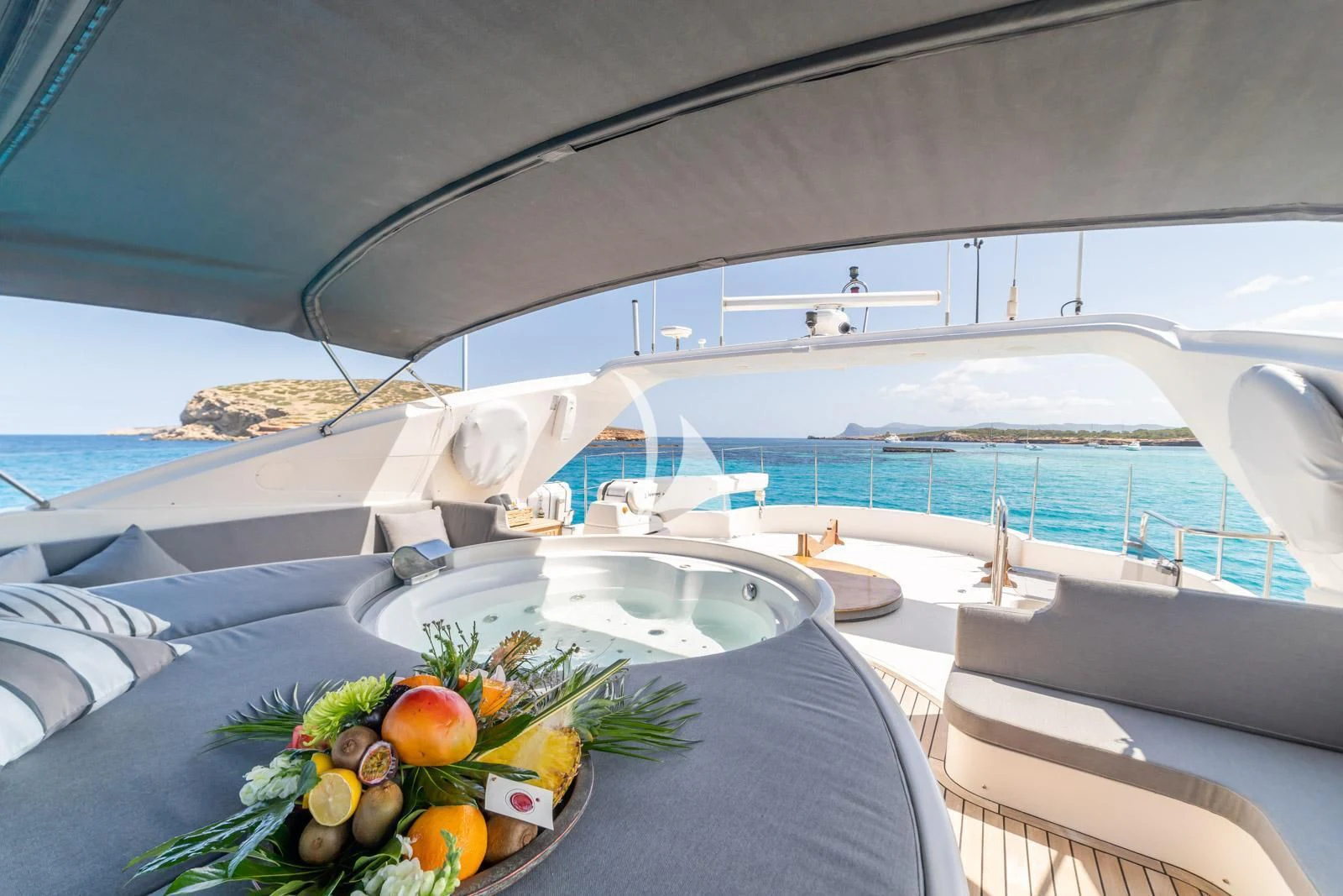 a boat with a bowl of fruit aboard IRMAO Yacht for Sale