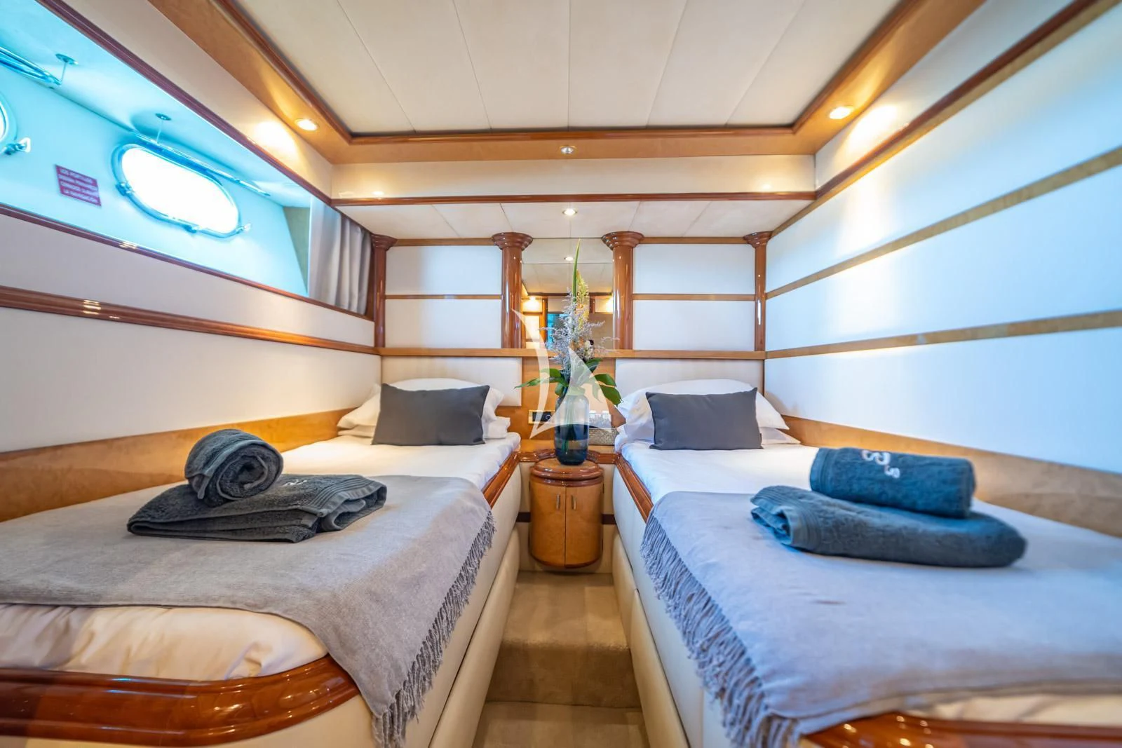 a room with two beds aboard IRMAO Yacht for Sale