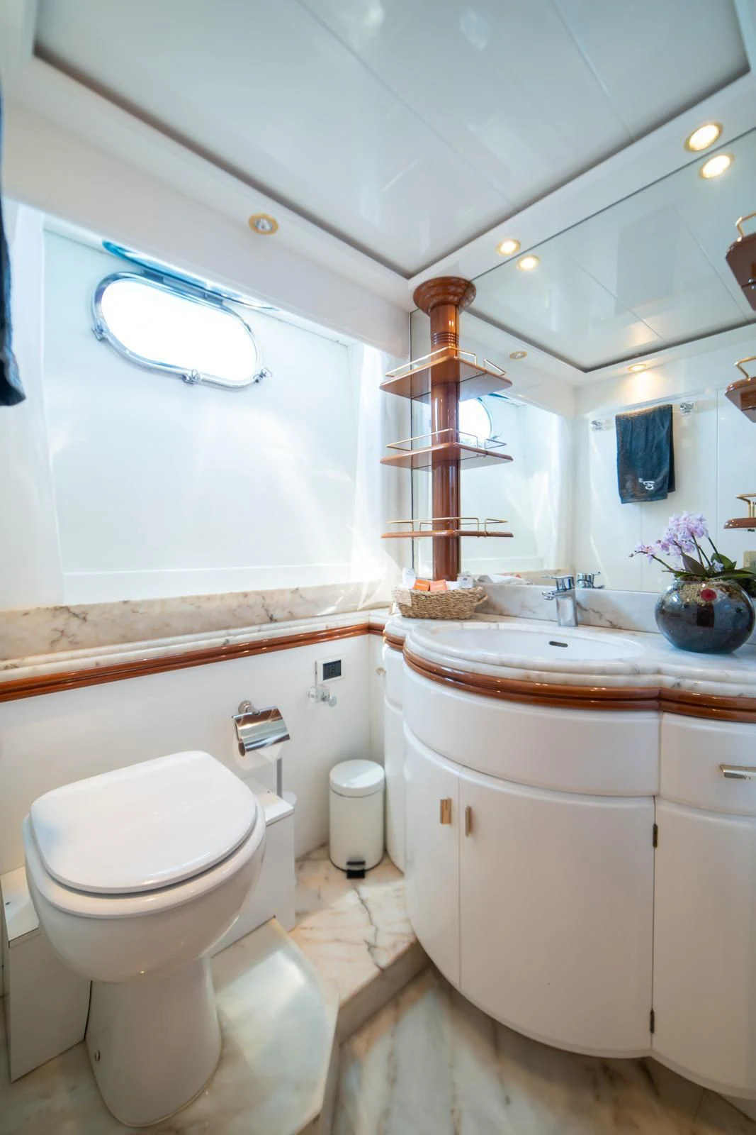 a bathroom with a toilet and sink aboard IRMAO Yacht for Sale