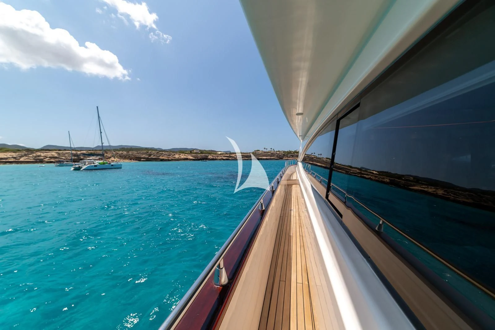 a boat on the water aboard IRMAO Yacht for Sale