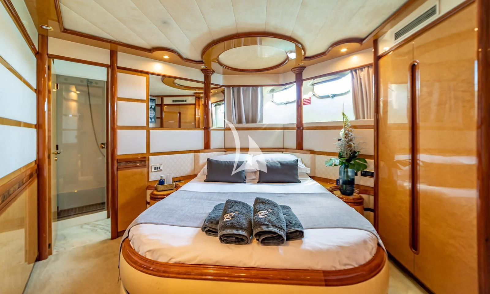 a bed in a room aboard IRMAO Yacht for Sale