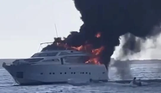 a car crashing into a boat aboard IRMAO Yacht for Sale