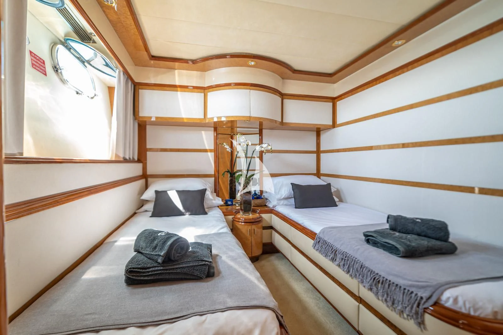 a couple of beds in a room aboard IRMAO Yacht for Sale