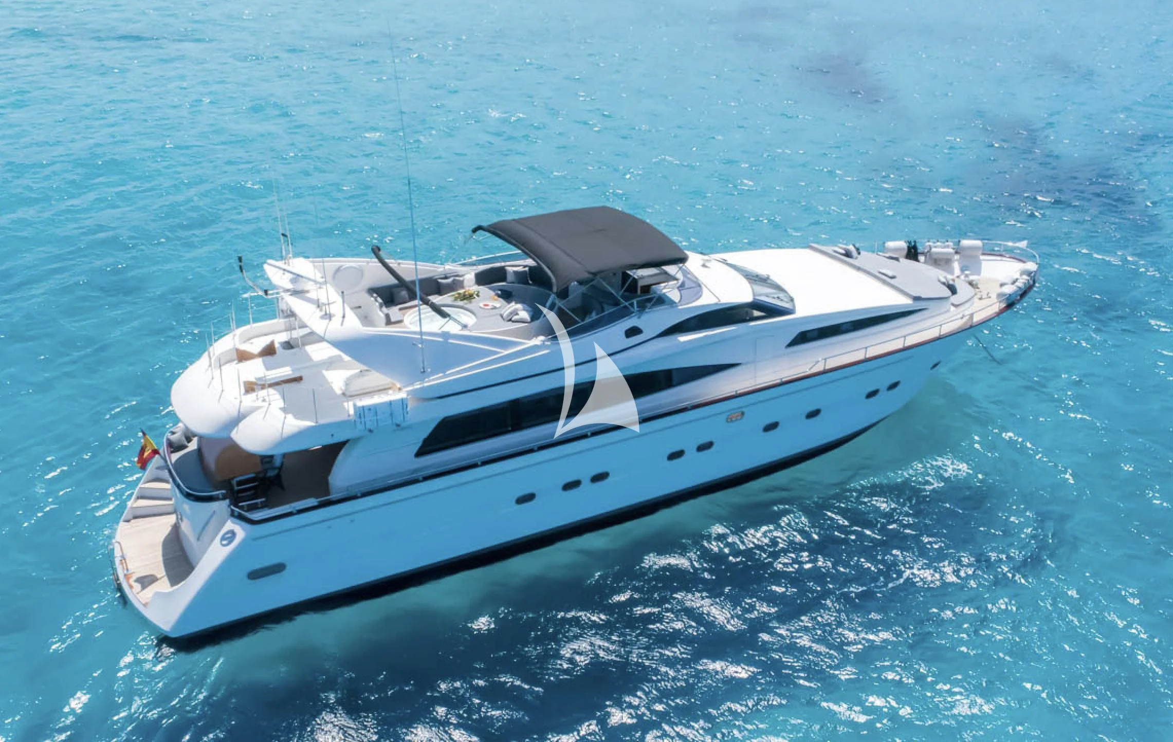 a white yacht in the water aboard IRMAO Yacht for Sale