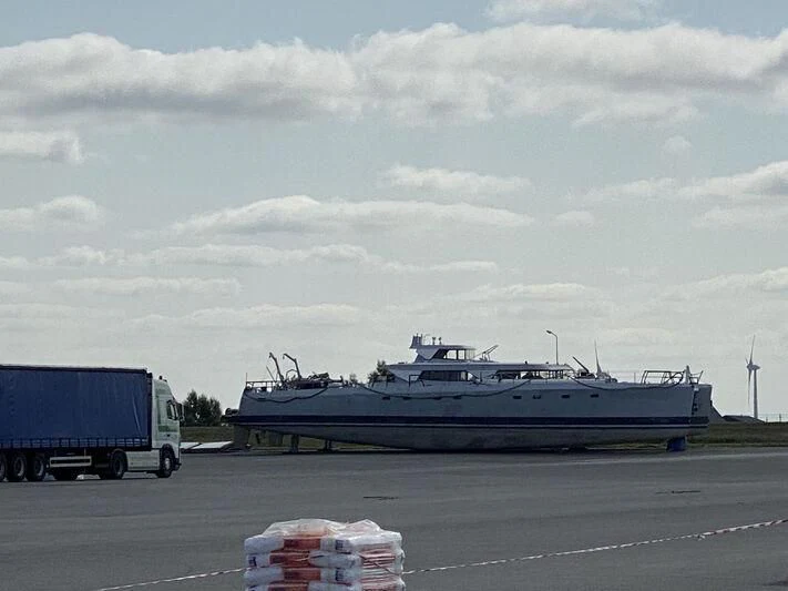 a large ship on the water aboard SABRINA Yacht for Sale