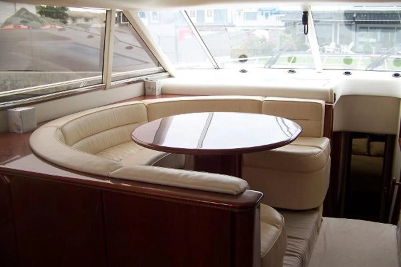 a room with a table and chairs aboard KAILANI Yacht for Sale