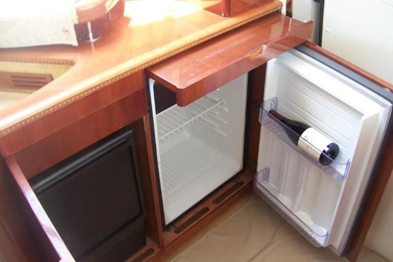 a cabinet with drawers aboard KAILANI Yacht for Sale