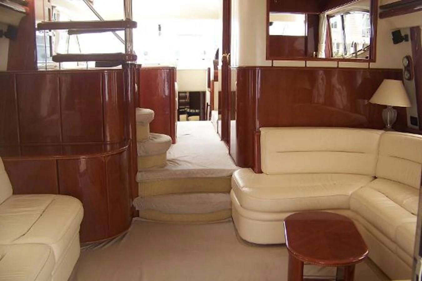a room with a bed and a couch aboard KAILANI Yacht for Sale