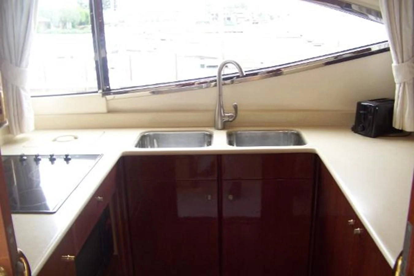 a kitchen sink and a window aboard KAILANI Yacht for Sale