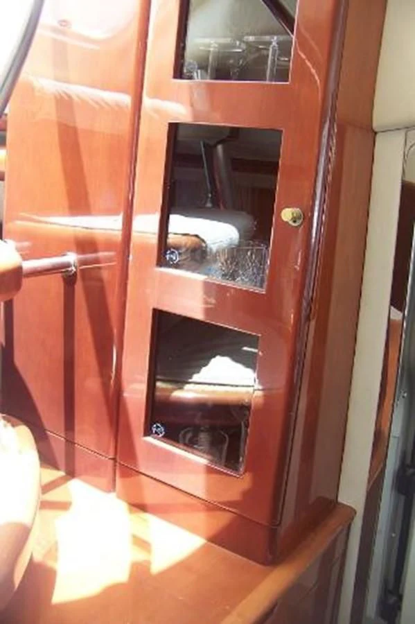 a person looking through a door aboard KAILANI Yacht for Sale