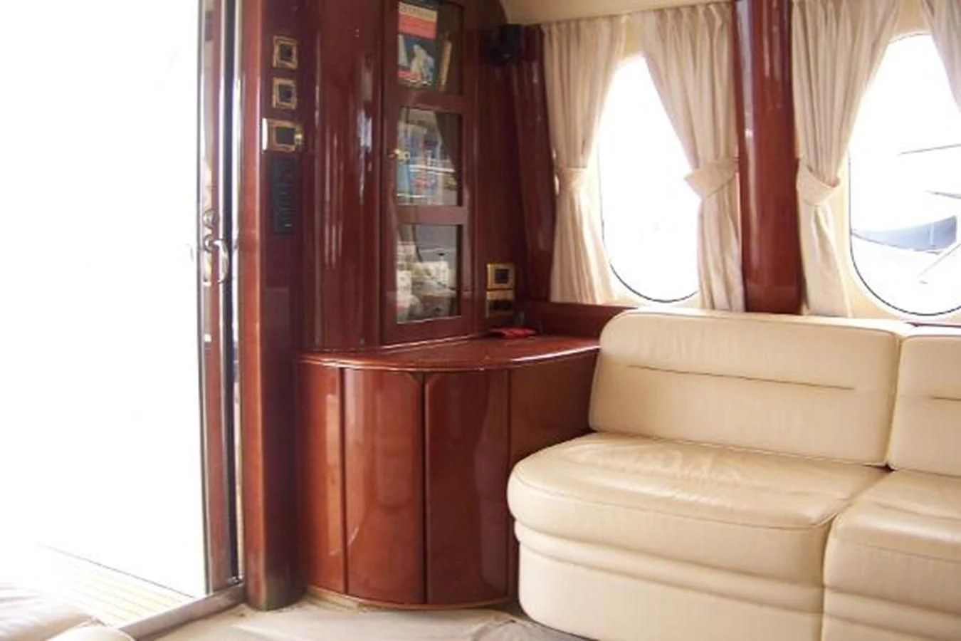 a room with a couch and a table aboard KAILANI Yacht for Sale
