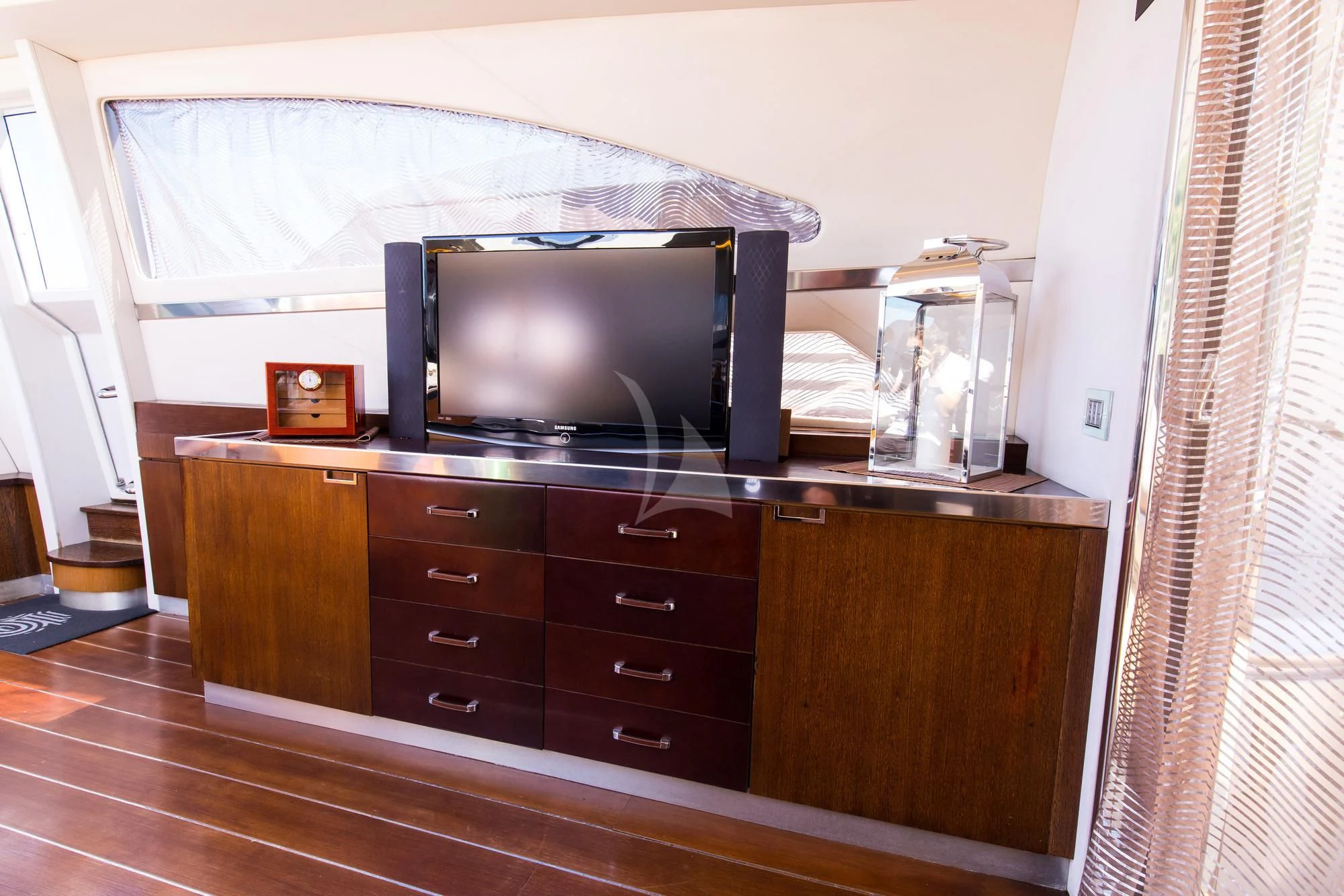 a tv on a dresser aboard CINQUE Yacht for Sale