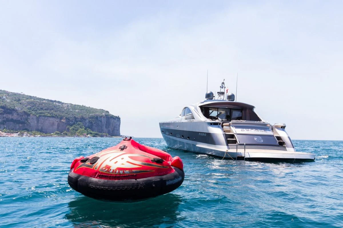 a boat and a boat in the water aboard CINQUE Yacht for Sale