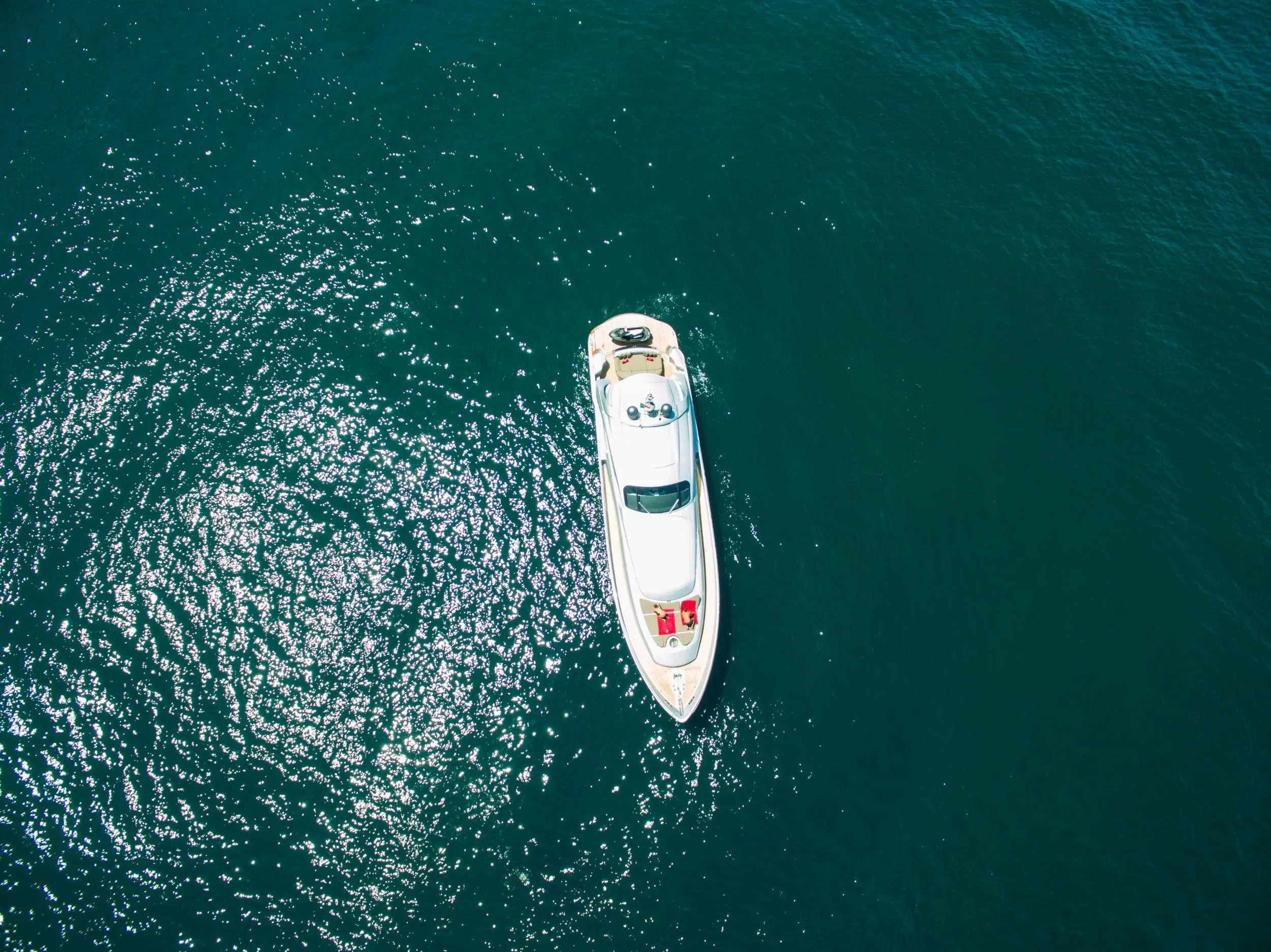a white boat in the water aboard CINQUE Yacht for Sale