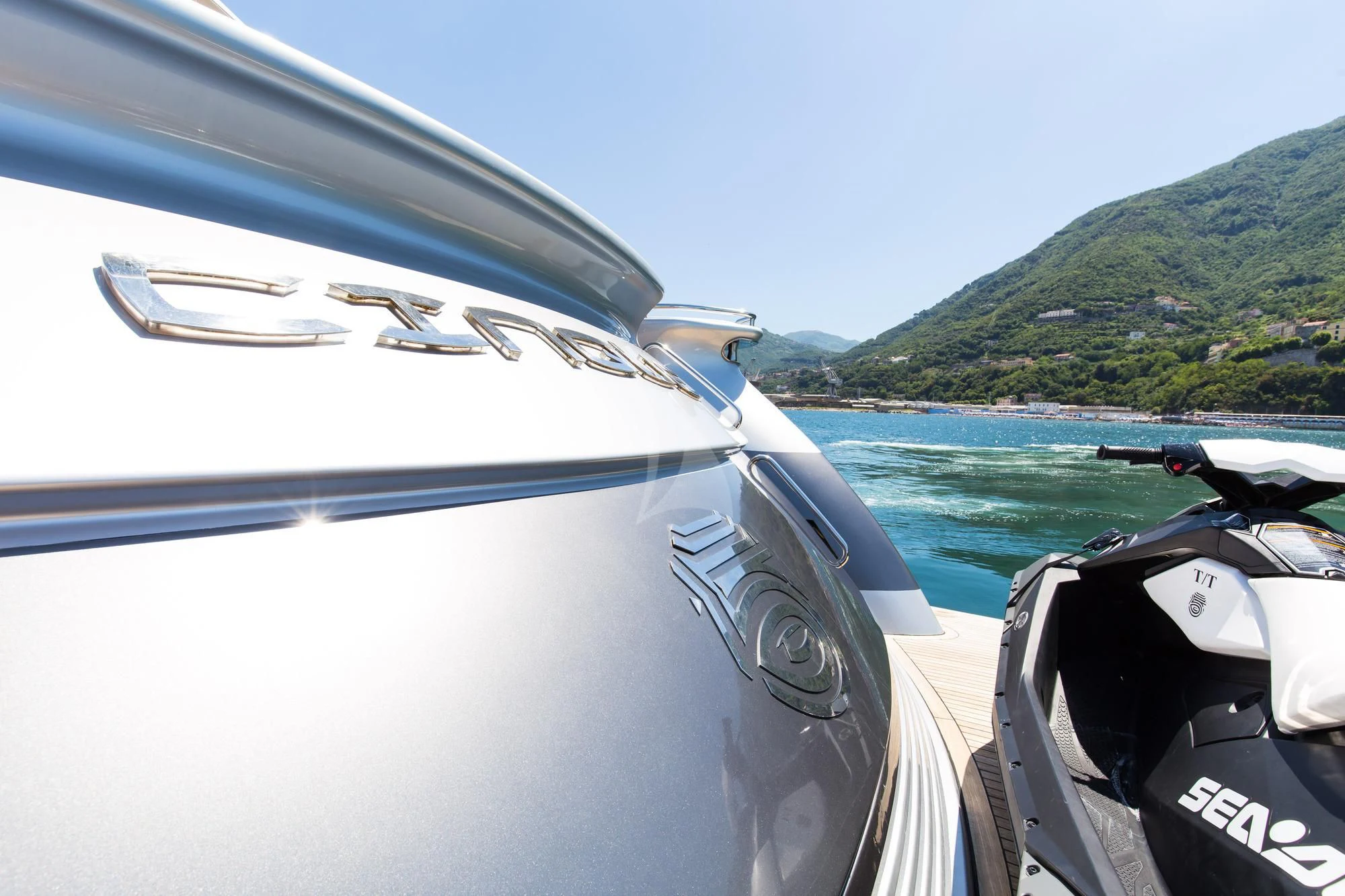 a car driving on a road aboard CINQUE Yacht for Sale