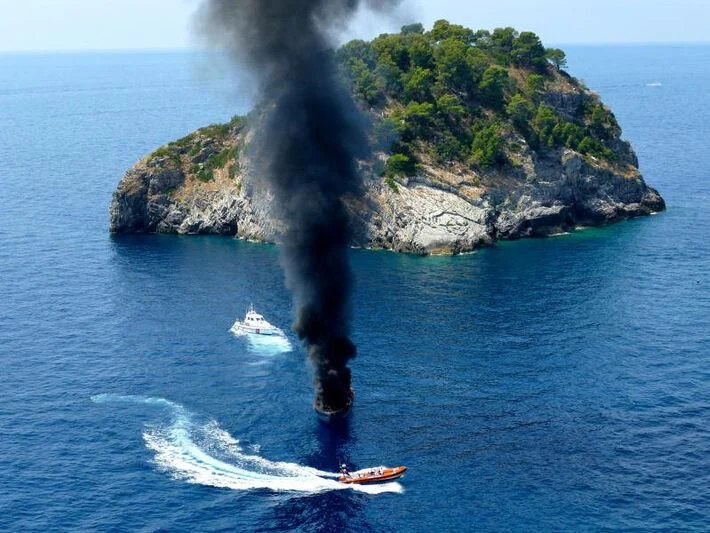 a boat on the water aboard CINQUE Yacht for Sale