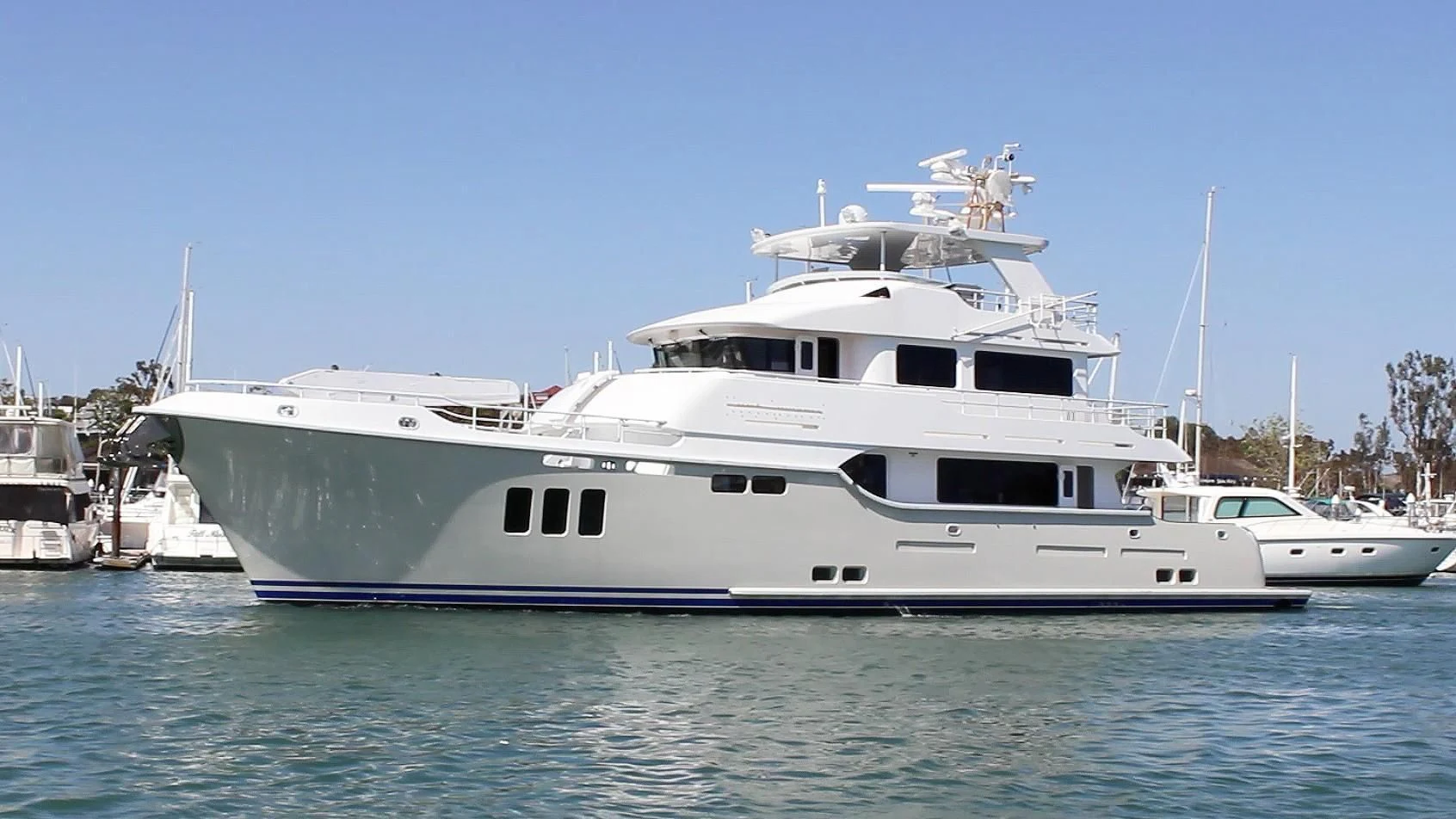 a large white boat in the water aboard WARBIRD Yacht for Sale