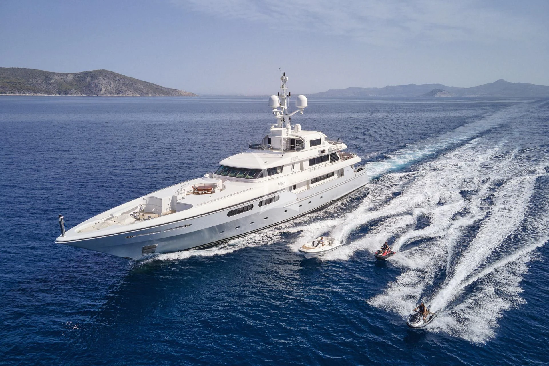 a large white ship on the water aboard ELENA V Yacht for Sale