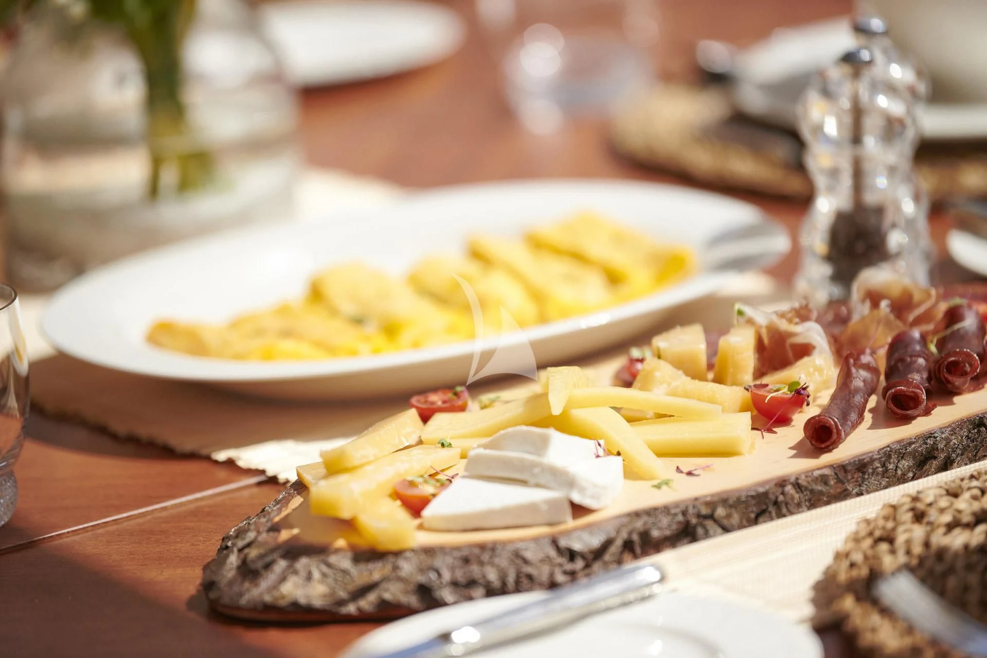 a plate of food aboard ELENA V Yacht for Sale