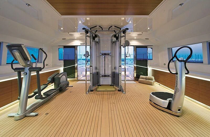 a gym with exercise equipment aboard ELENA V Yacht for Sale
