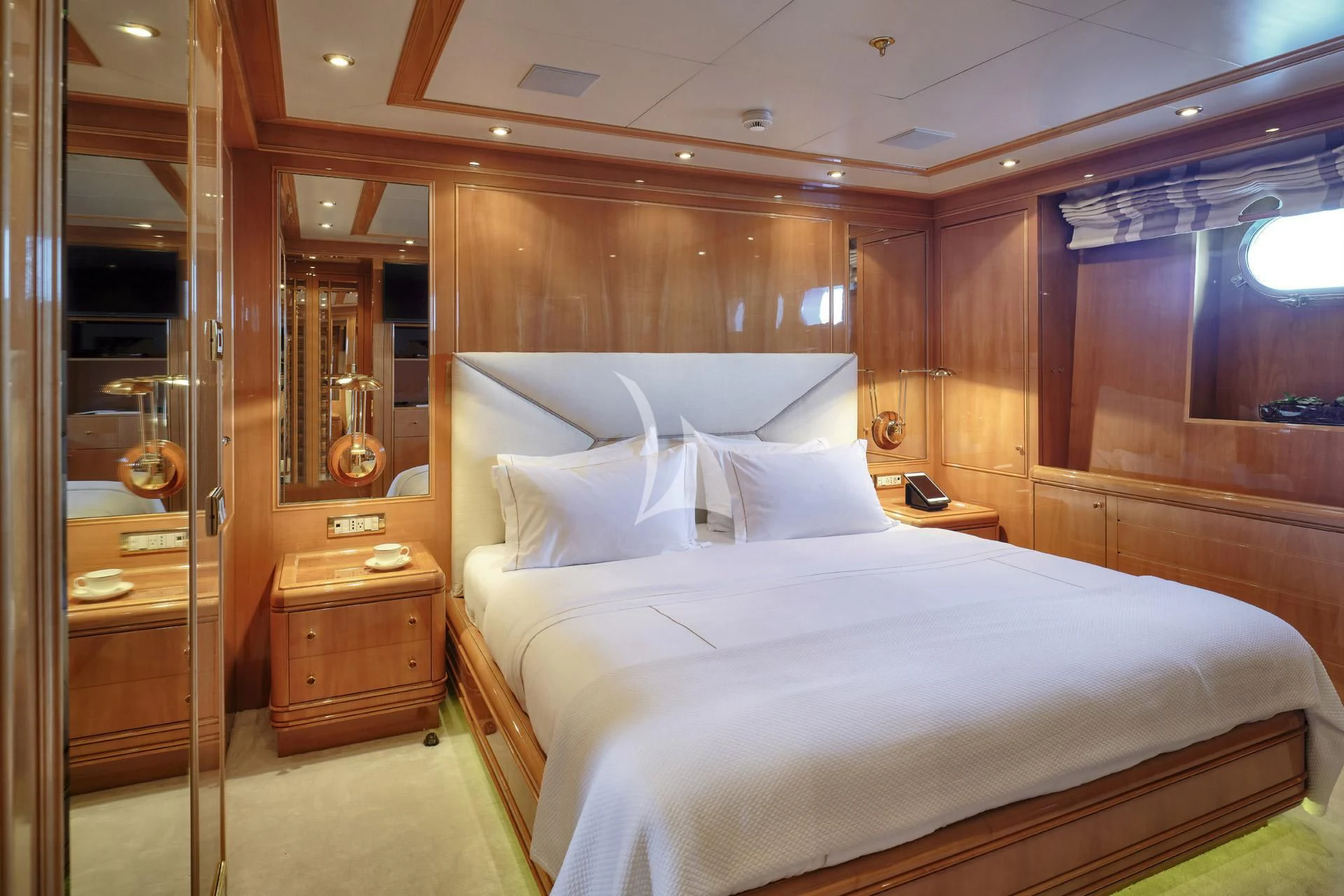 a bed in a room aboard ELENA V Yacht for Sale