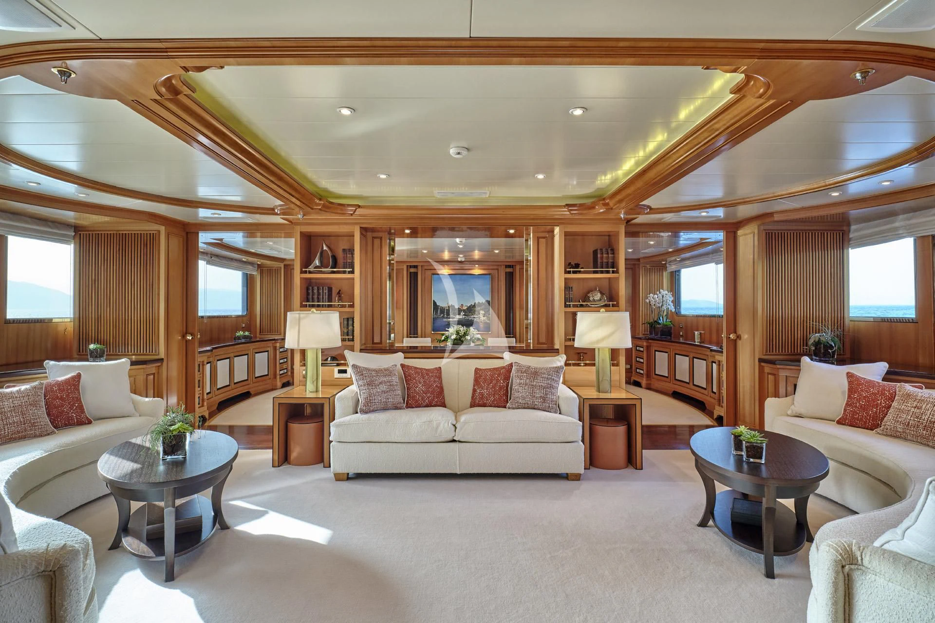 a living room with a large mirror aboard ELENA V Yacht for Sale
