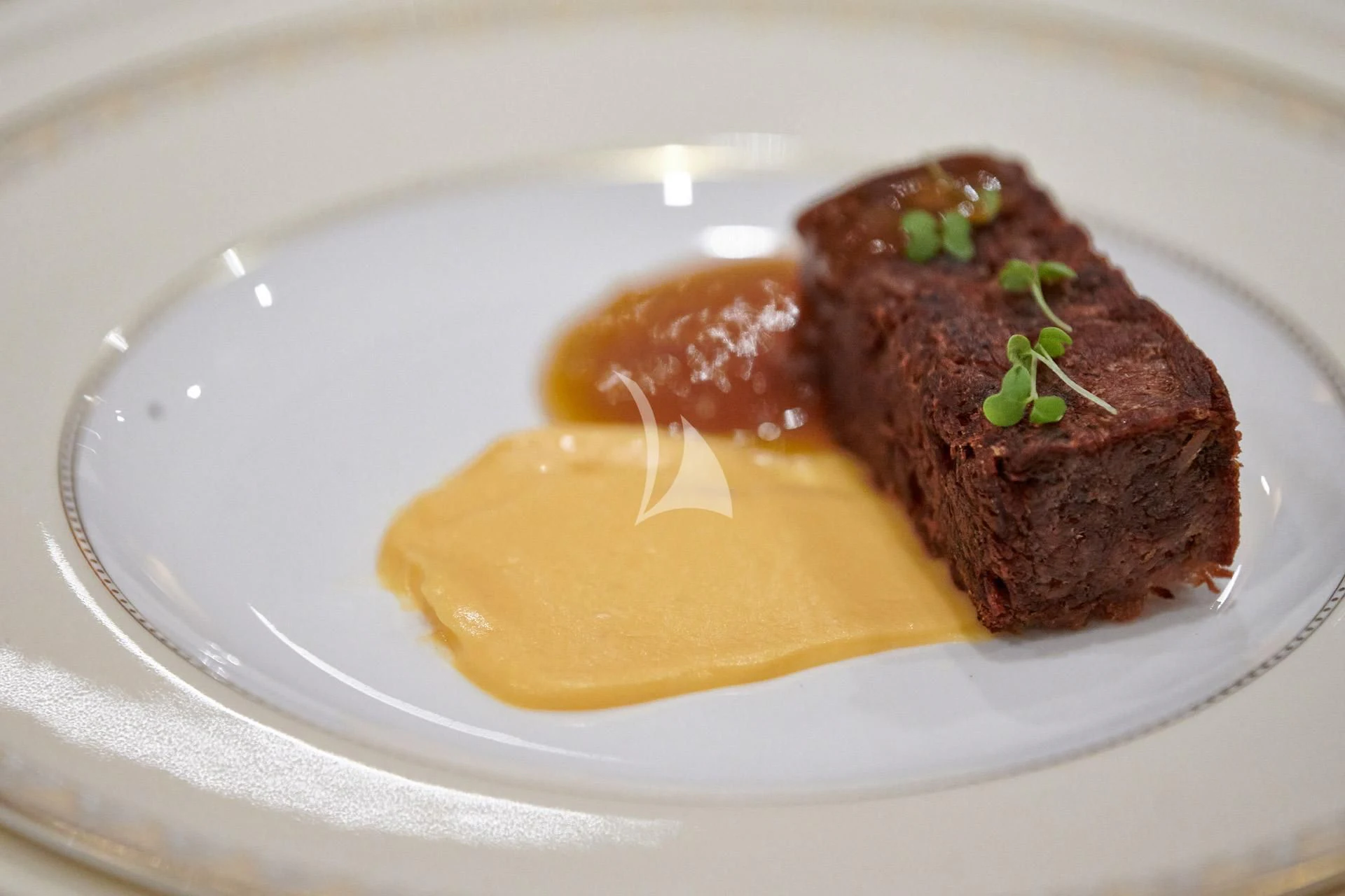 a plate of food aboard ELENA V Yacht for Sale