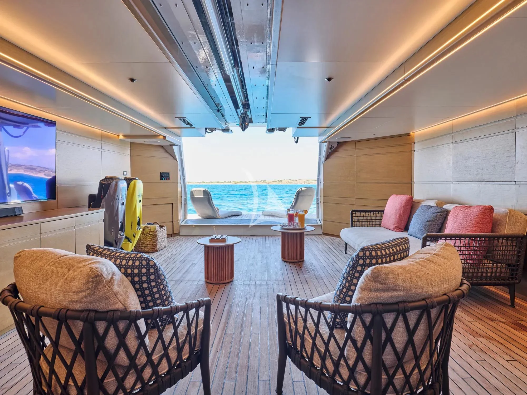 a living room with a large window aboard ELENA V Yacht for Sale