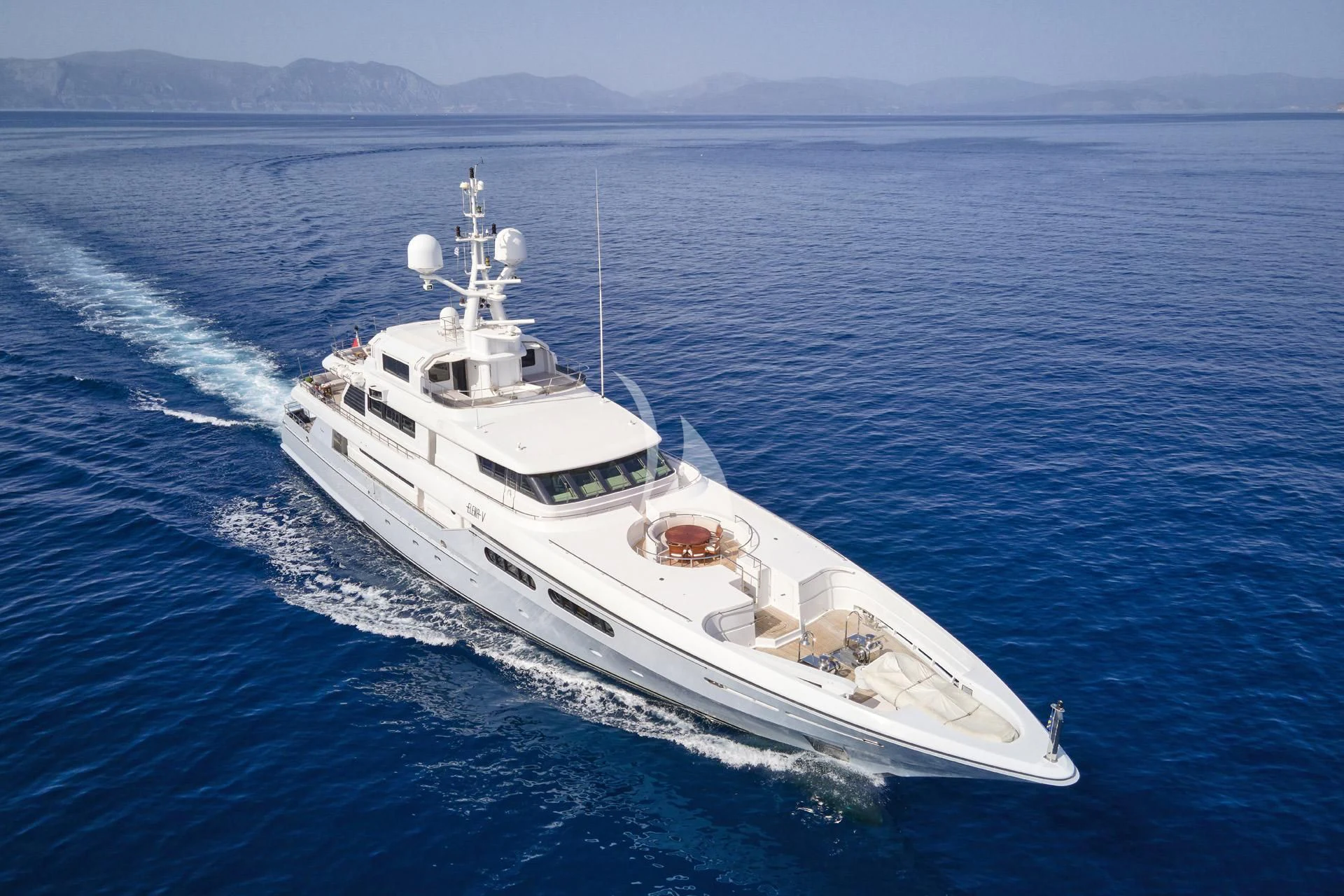 a white boat on the water aboard ELENA V Yacht for Sale