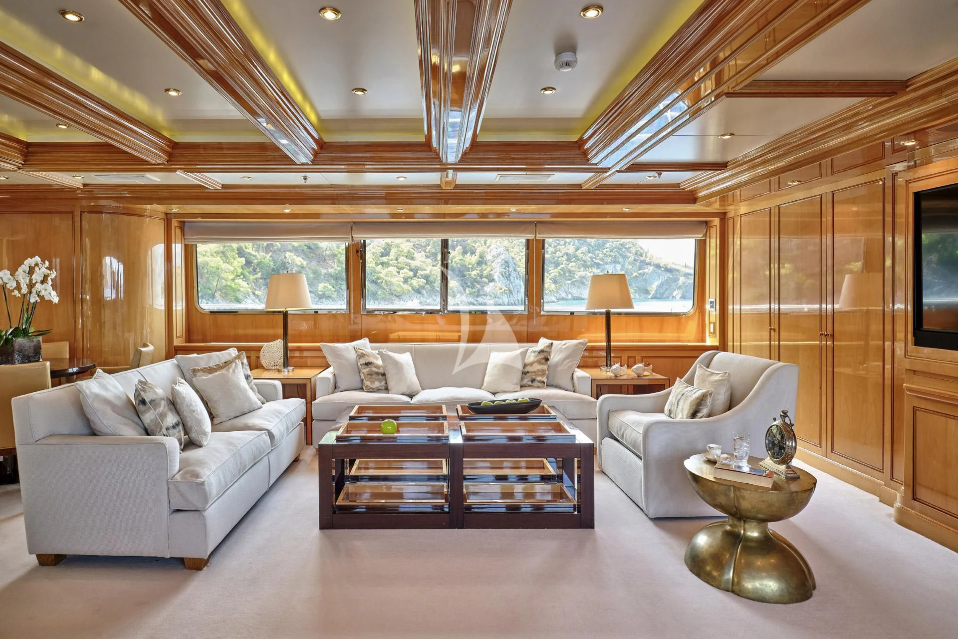a living room with a large window aboard ELENA V Yacht for Sale