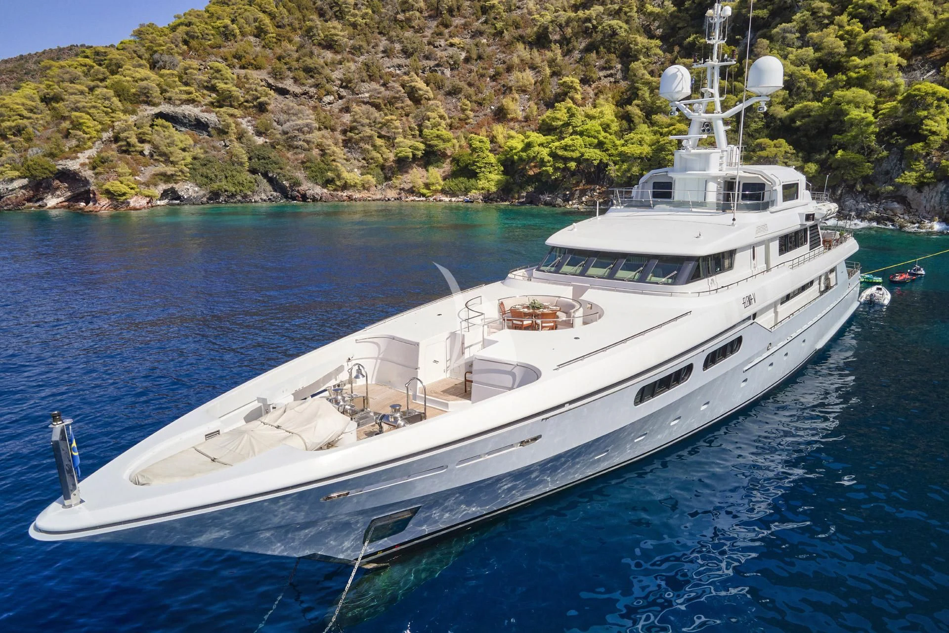 a white yacht in the water aboard ELENA V Yacht for Sale