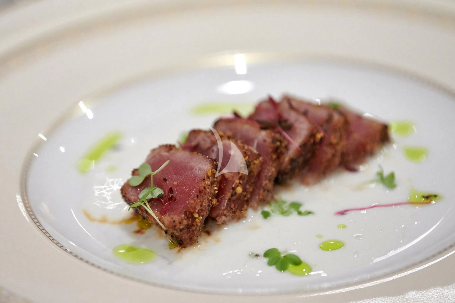 a plate of food aboard ELENA V Yacht for Sale