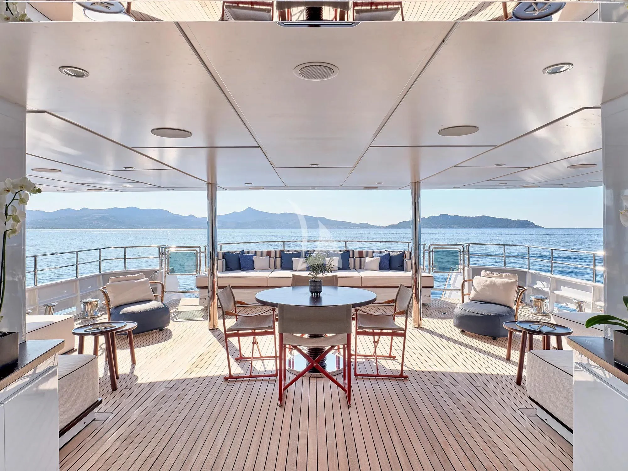 a room with a table and chairs aboard ELENA V Yacht for Sale