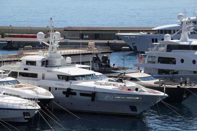 several boats docked at a pier aboard ELENA V Yacht for Sale