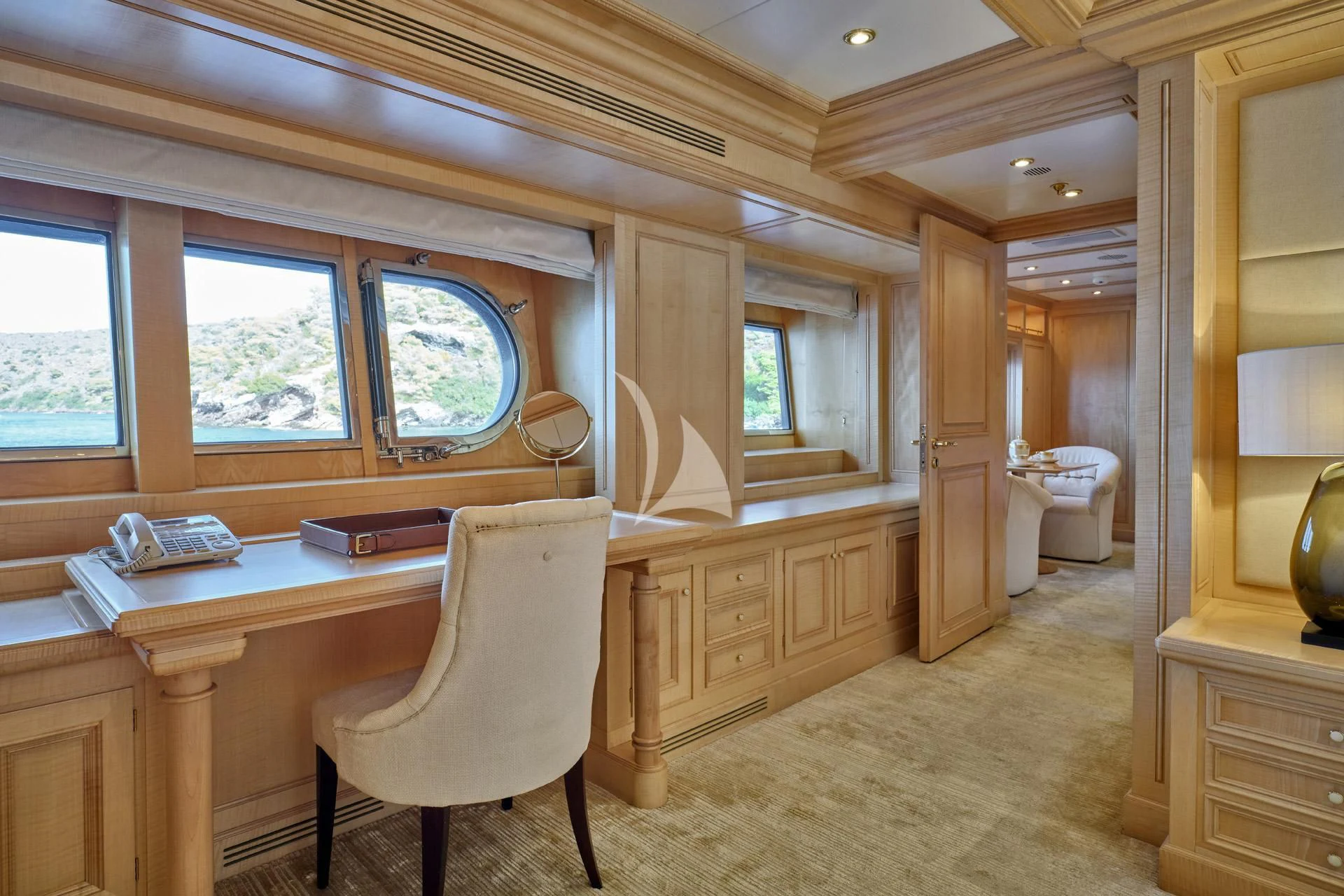 a room with a desk and a chair aboard ELENA V Yacht for Sale