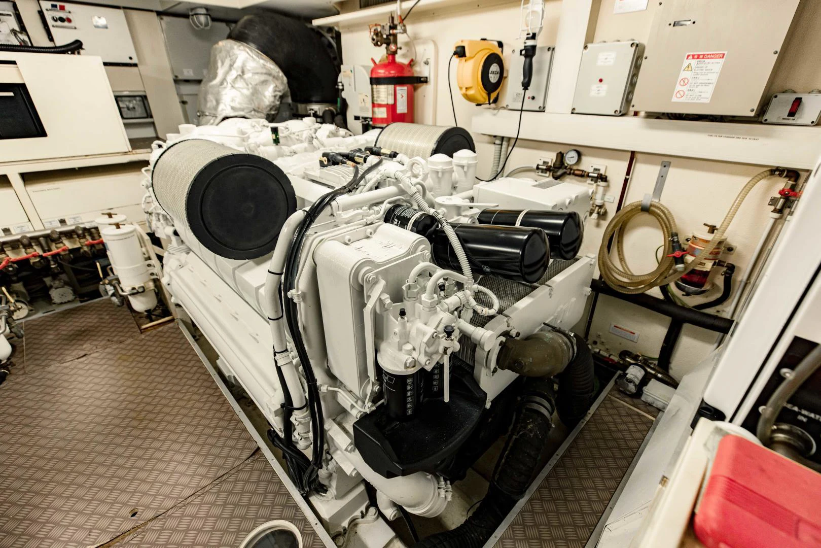 a car in a garage aboard SHE RUNS WET Yacht for Sale