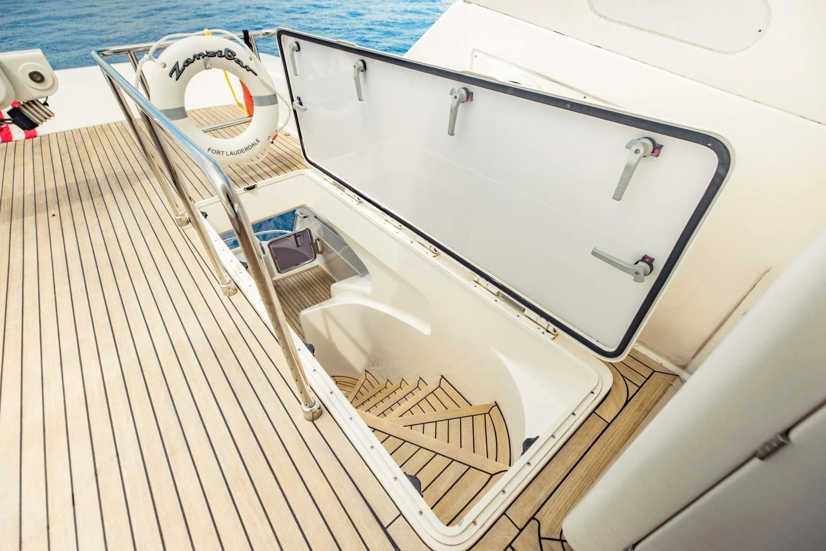 a boat on a deck aboard SHE RUNS WET Yacht for Sale